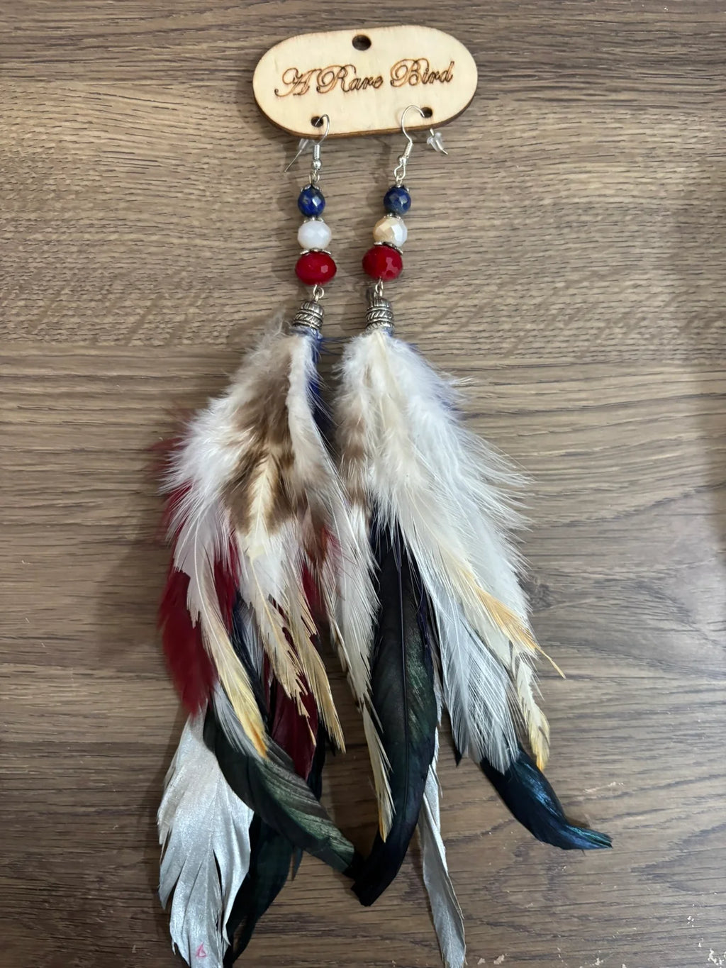 A Rare Bird Feather Red, White & Soar Feather Earrings