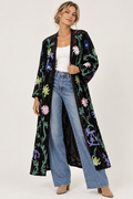Paper lace coat on a different model, with wording removed