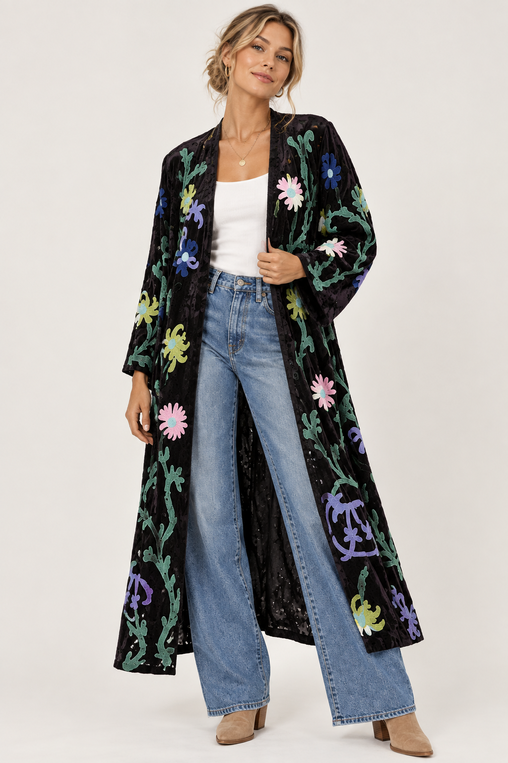 Paper lace coat on a different model, with wording removed